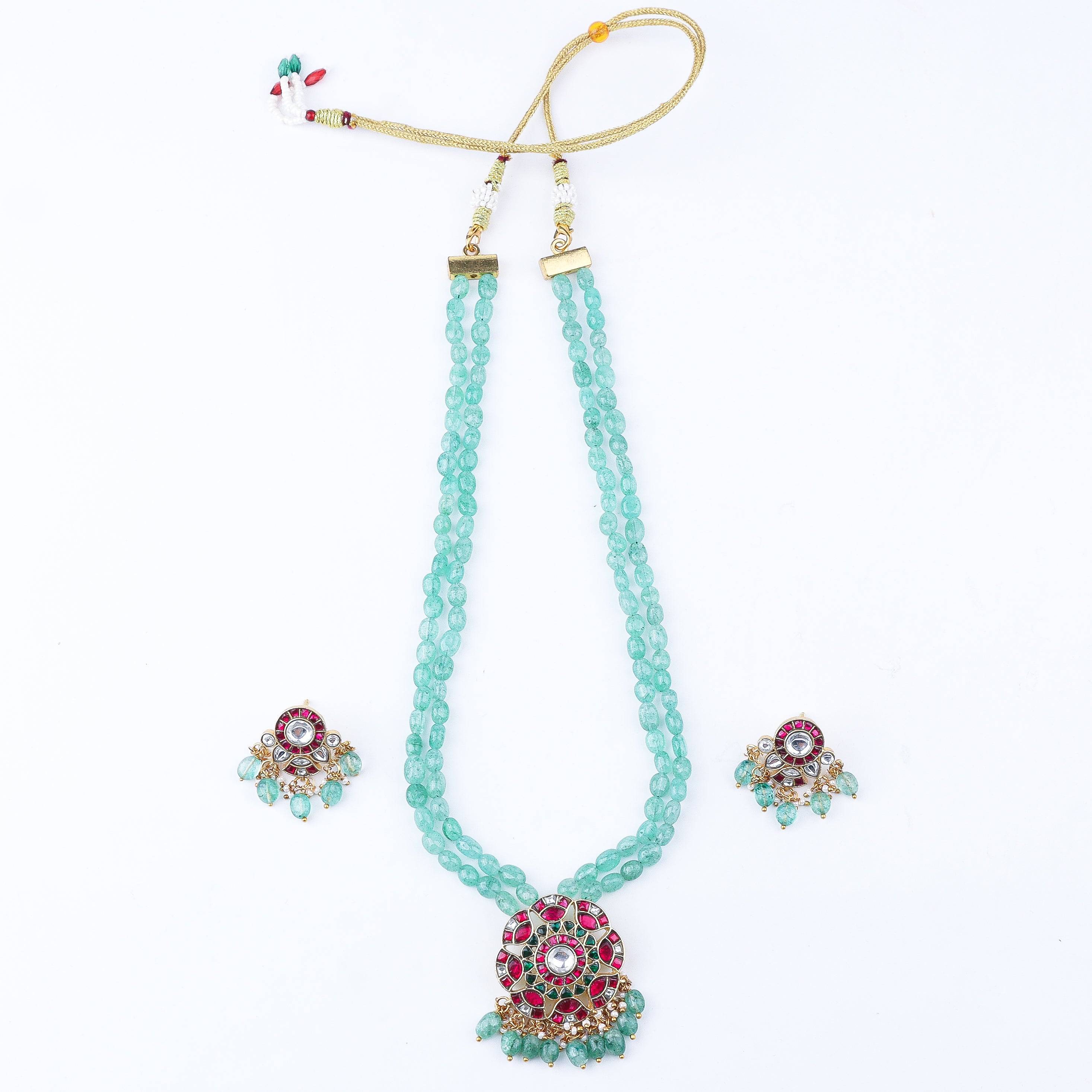 Flat-lay of 22K Gold-Plated Fashion Set with complementary gold-plated jewelry and elegant festive accessories