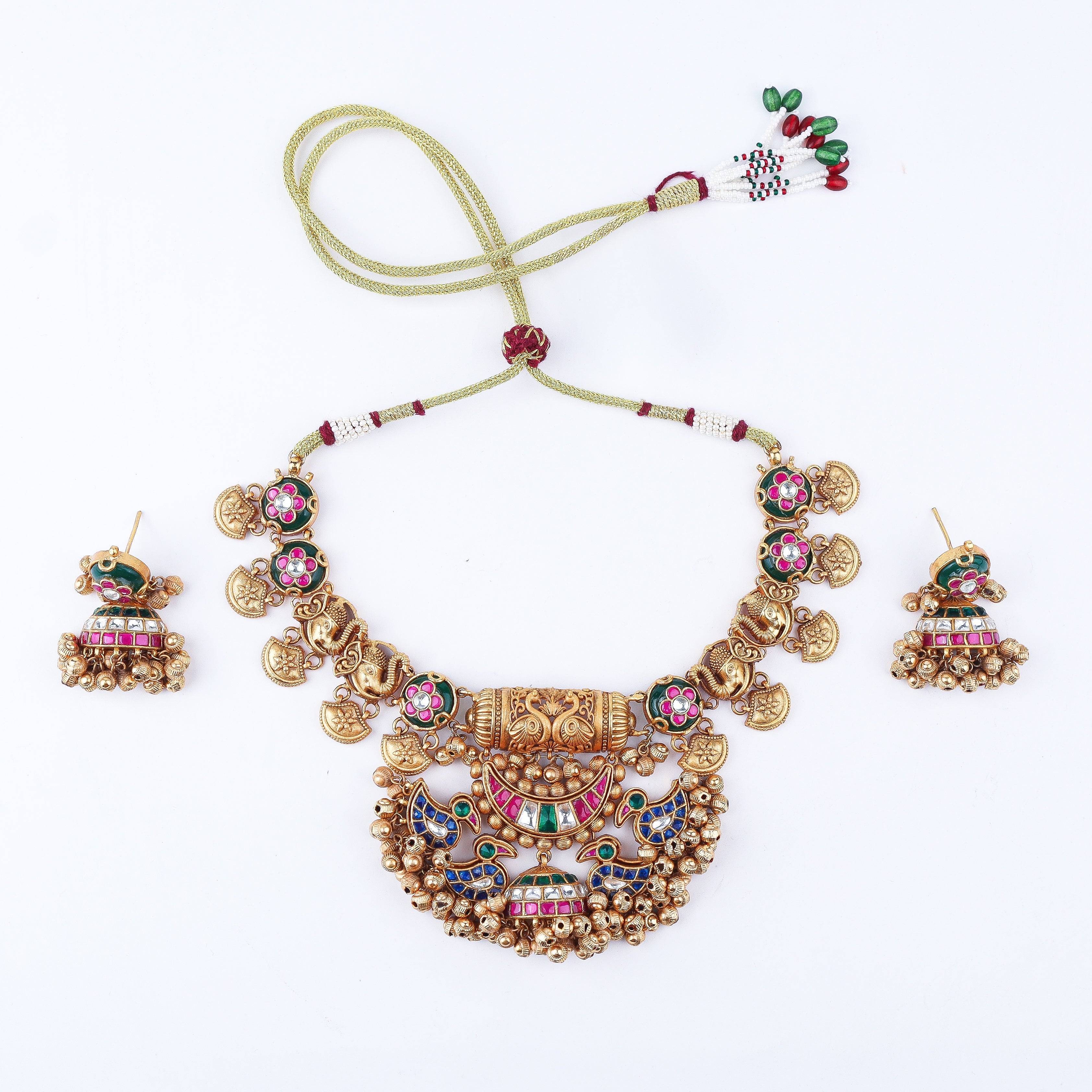 Detailed view of 22K gold-plated fashion set highlighting intricate motifs, textured detailing, and premium 22K gold-plated finish