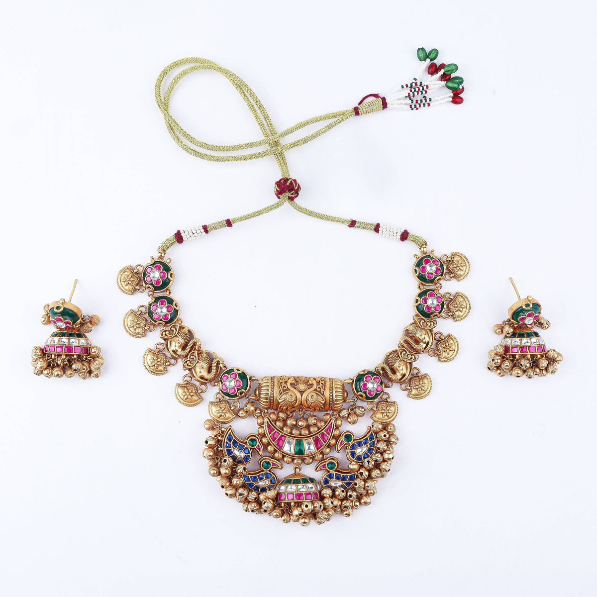 Detailed view of 22K gold-plated fashion set highlighting intricate motifs, textured detailing, and premium 22K gold-plated finish