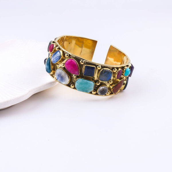 Angled view of the Brass Fashion Bracelet highlighting its unique silhouette, structure, and polished brass finish