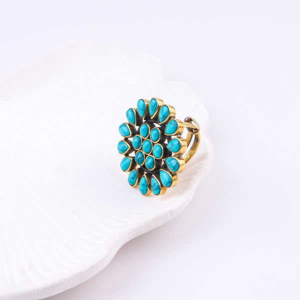 Angled view of the Brass Fashion Ring highlighting its distinctive shape, structure, and polished brass finish