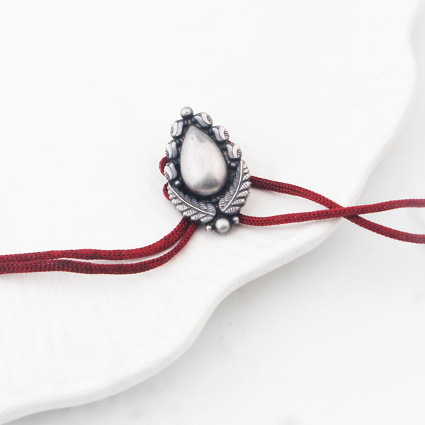 Handcrafted Silver Rakhi/Pendant: Drop
