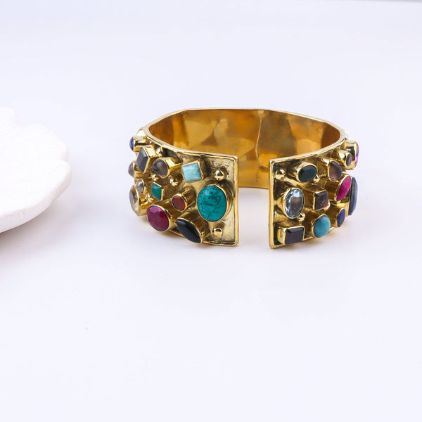 Angled view of the Brass Fashion Bracelet highlighting its unique silhouette, structure, and polished brass finish