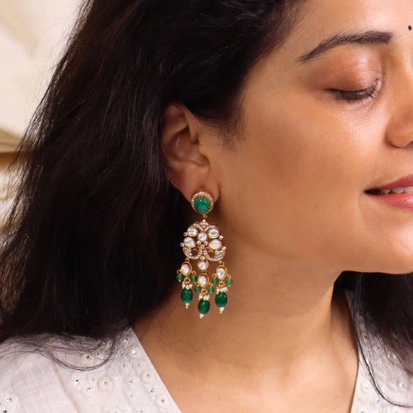 Model wearing 22K gold-plated fashion earrings for a sophisticated and contemporary jewelry look