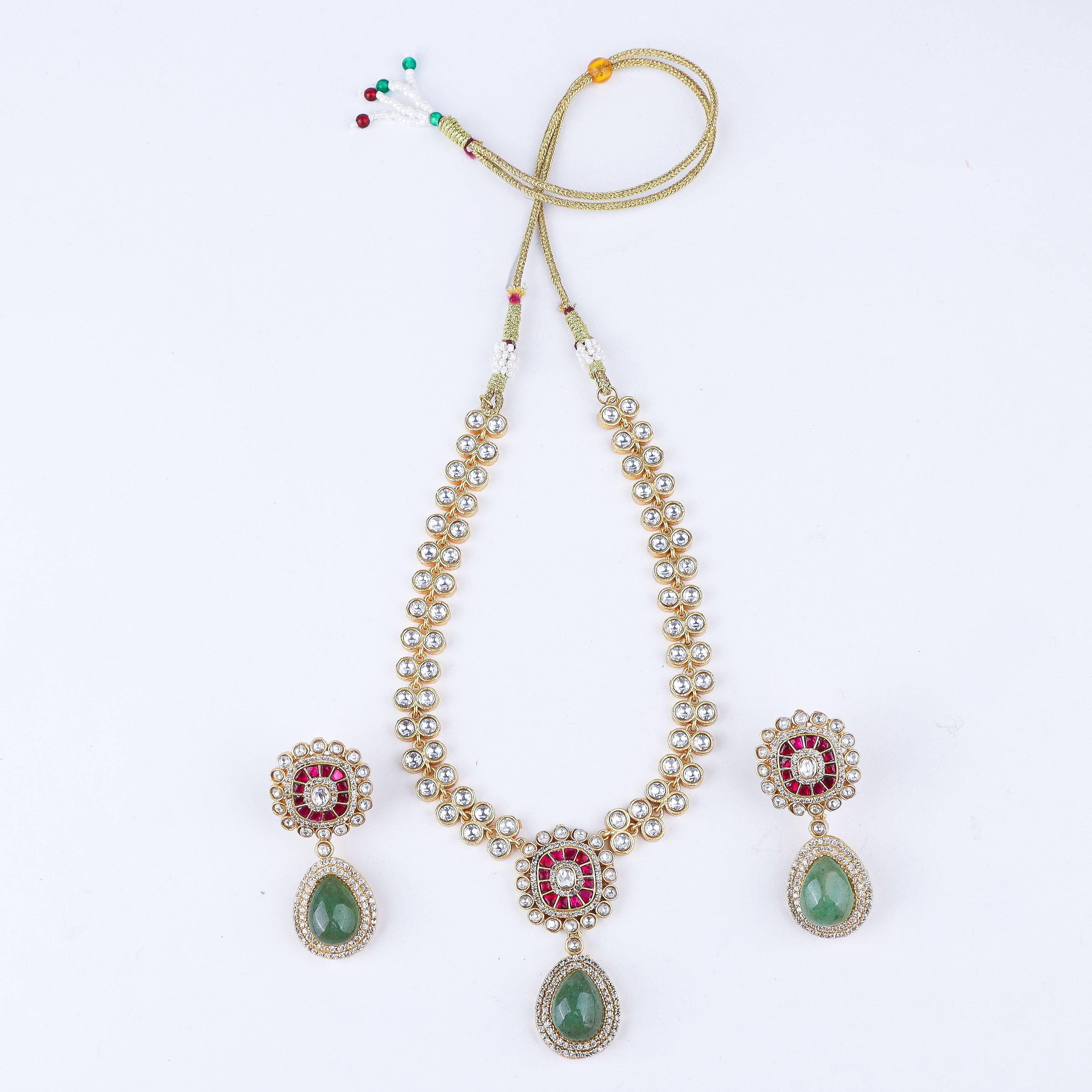 Detailed view of the 22K gold-plated fashion set highlighting intricate motifs, textured detailing, and a premium 22K gold-plated finish