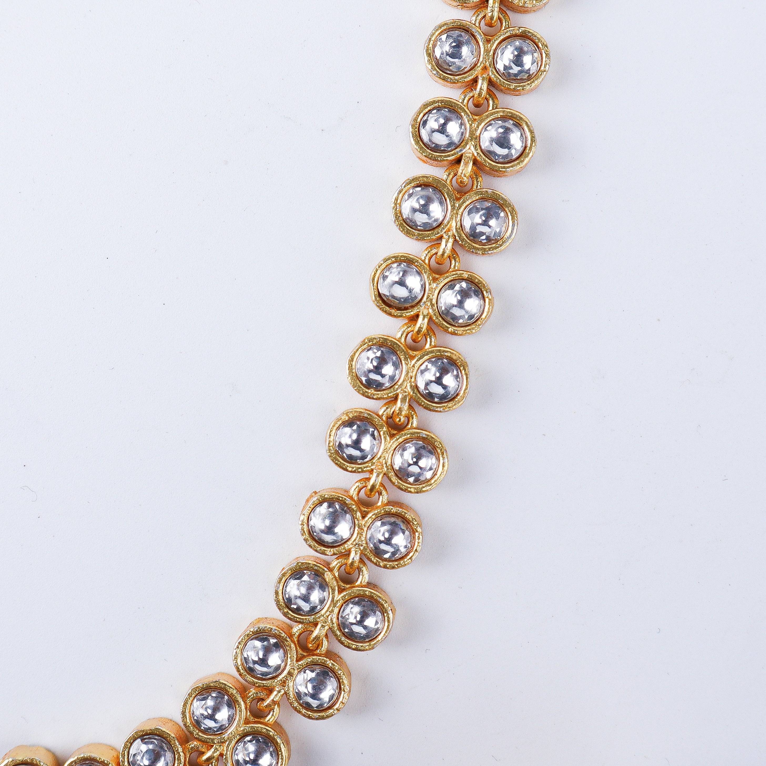 Angled view of the 22K gold-plated fashion set highlighting its coordinated design, elegant structure, and polished gold finish