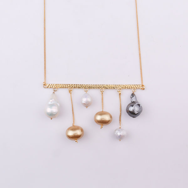 Gold necklace with baroque, freshwater, and golden pearls