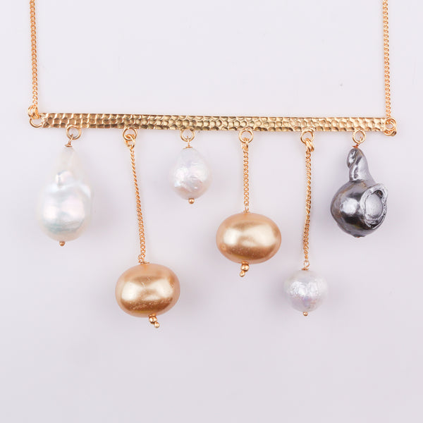 Pearl and gold necklace with baroque, freshwater, and golden pearls