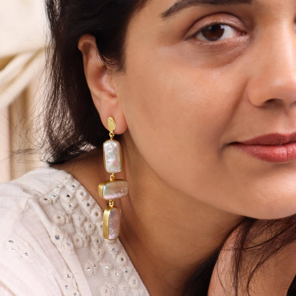 Model wearing 22K gold-plated fashion earrings for a sophisticated and contemporary jewellery look