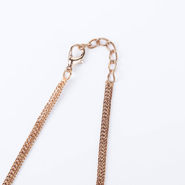 Angled view of the 22K gold-plated fashion set highlighting its coordinated design, elegant structure, and polished gold finish