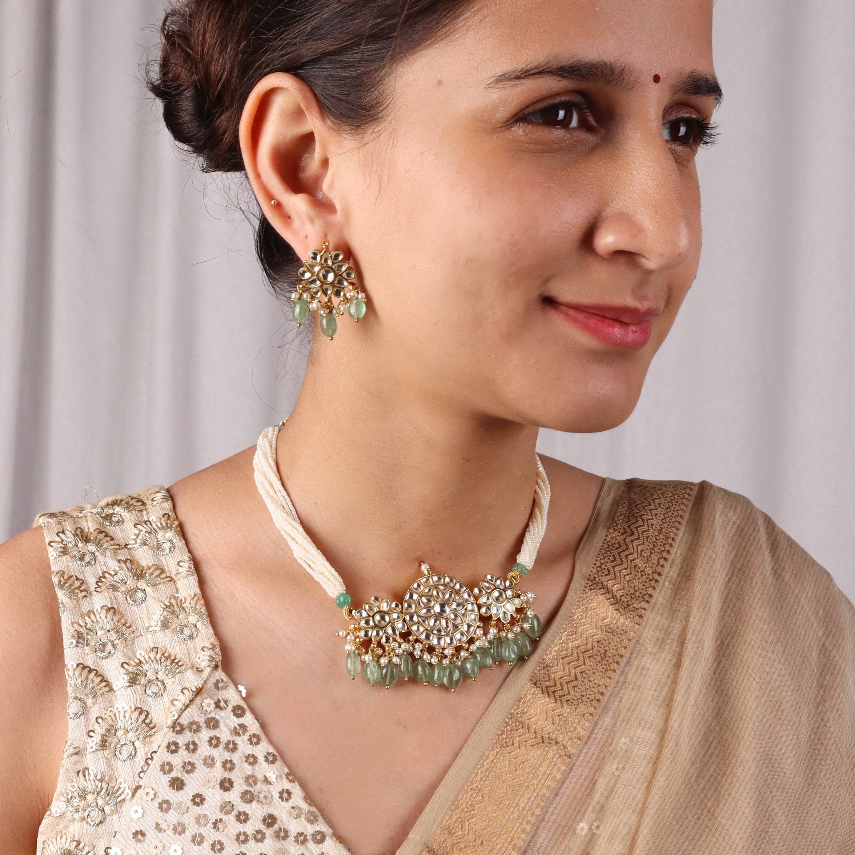Model wearing 22K gold-plated fashion sets for a sophisticated and elegant jewelry look