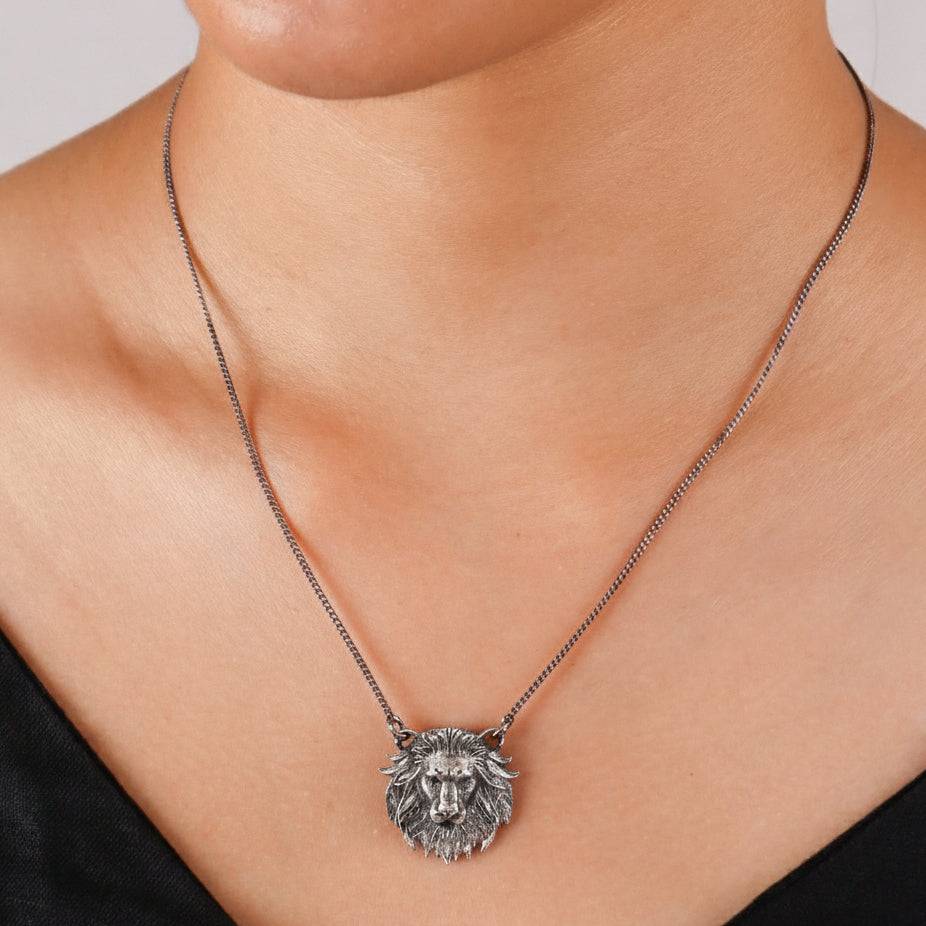 Silver lion pendant necklace on model