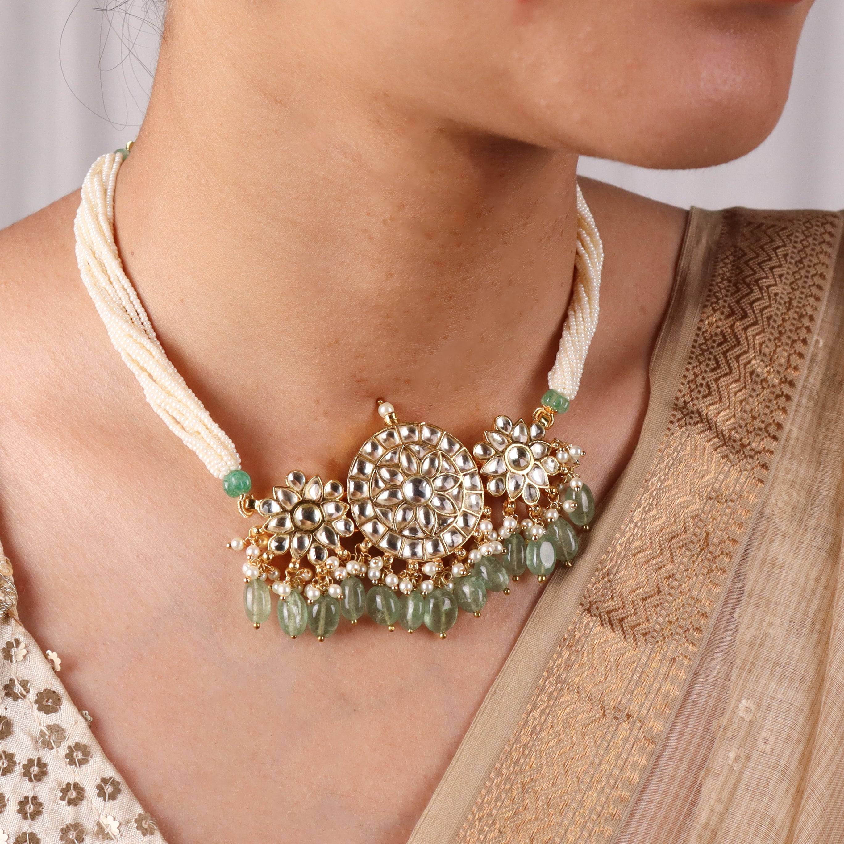 Model wearing 22K gold-plated fashion sets for a sophisticated and elegant jewelry look