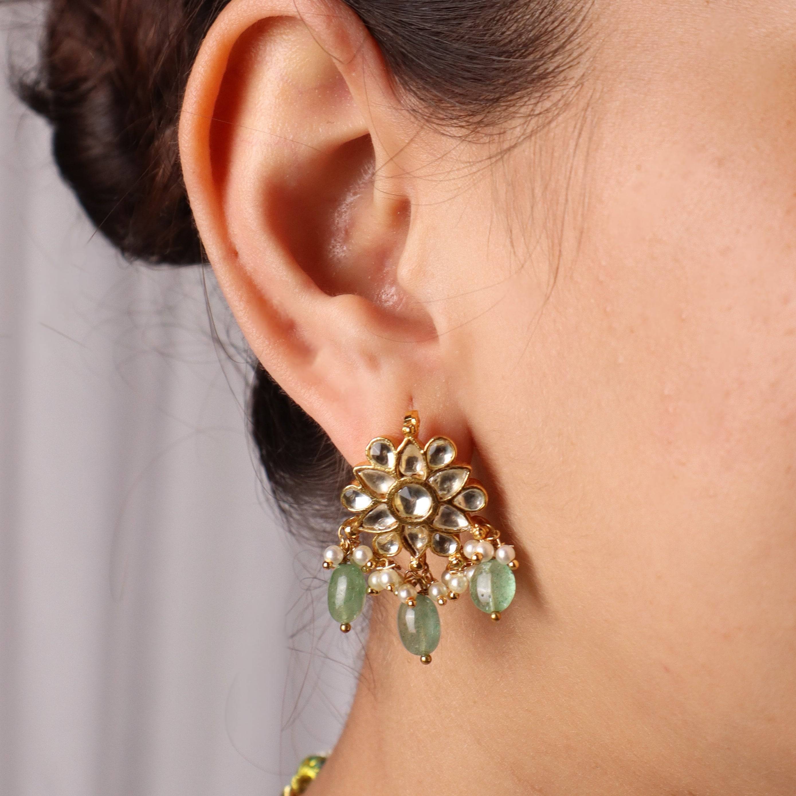 Model wearing 22K gold-plated fashion sets for a sophisticated and elegant jewelry look