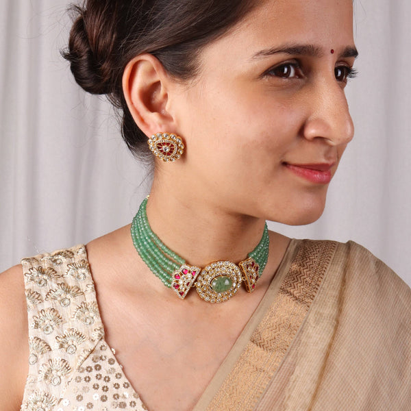Model wearing 22K gold-plated fashion sets for a sophisticated and elegant jewellery look