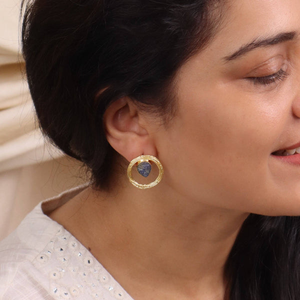 Model wearing 22K gold-plated fashion earrings for a sophisticated and contemporary jewelry look