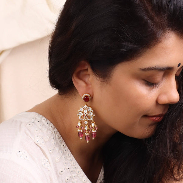 Model wearing 22K gold-plated fashion earrings for a sophisticated and contemporary jewelry look