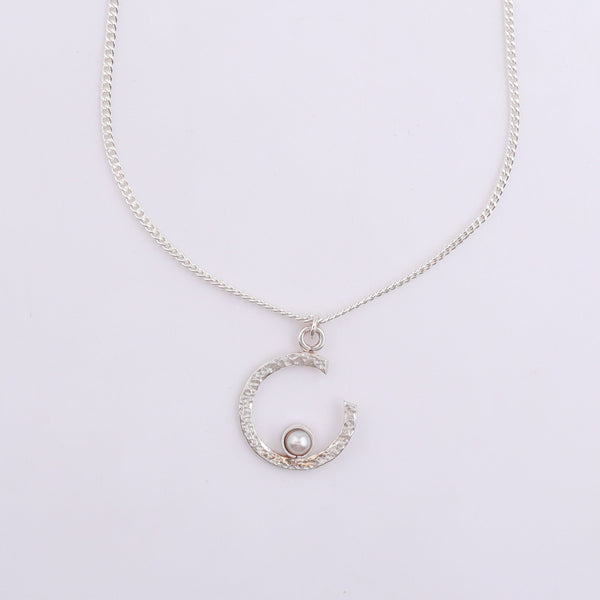 Close-up of silver chain necklace