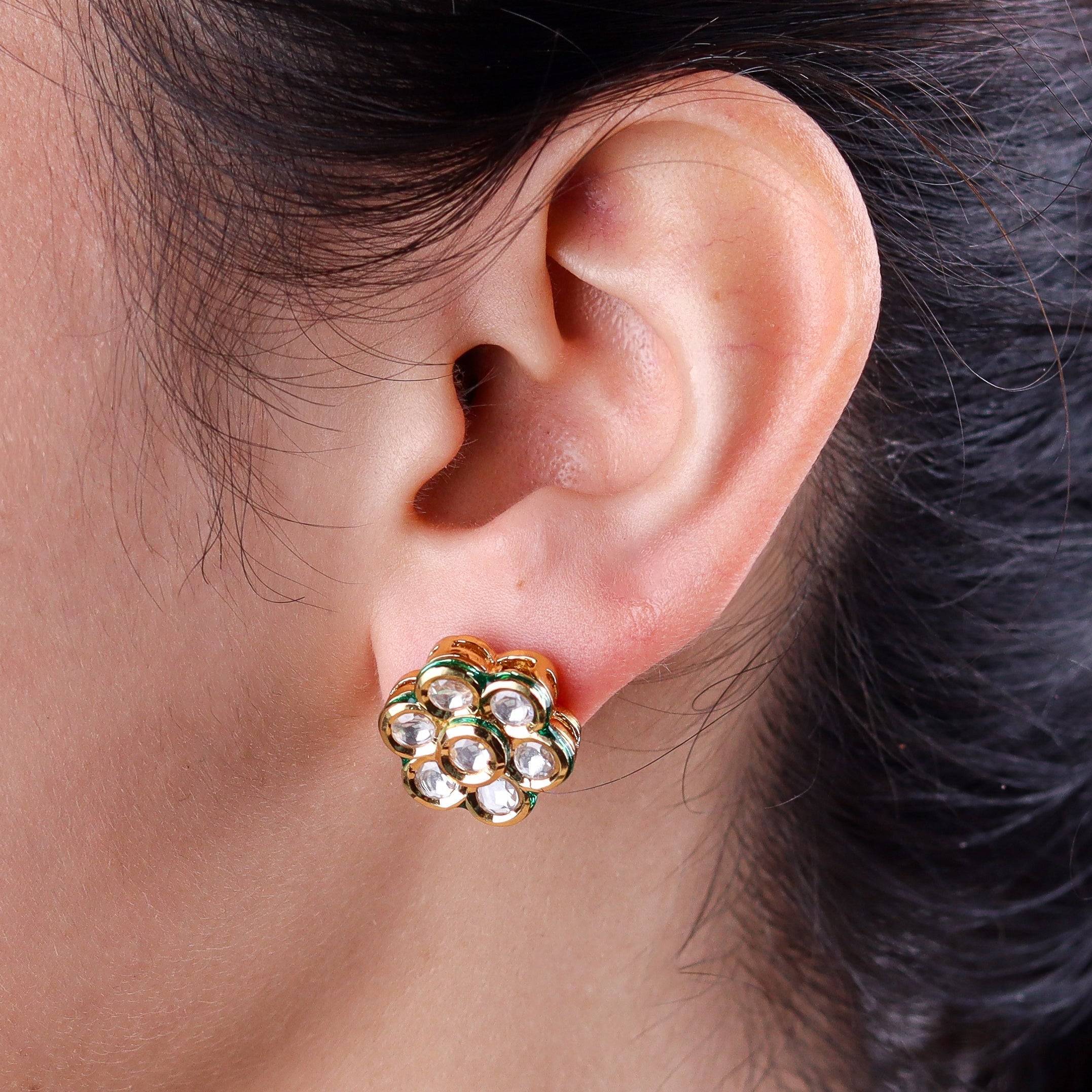 Model wearing a 22K gold-plated fashion earring for a sophisticated and contemporary jewelry look
