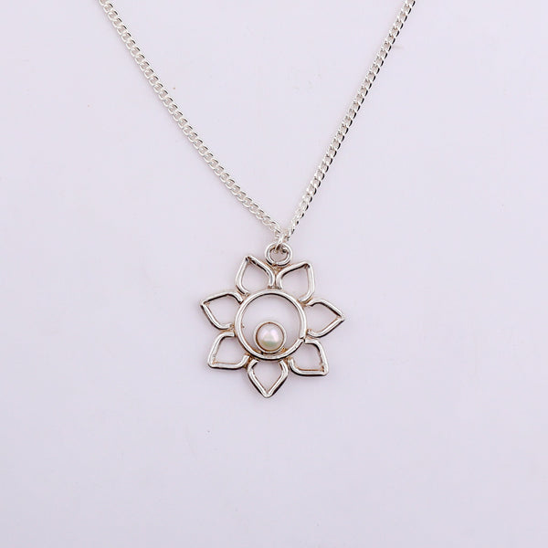 Silver flower pendant necklace with pearl detail