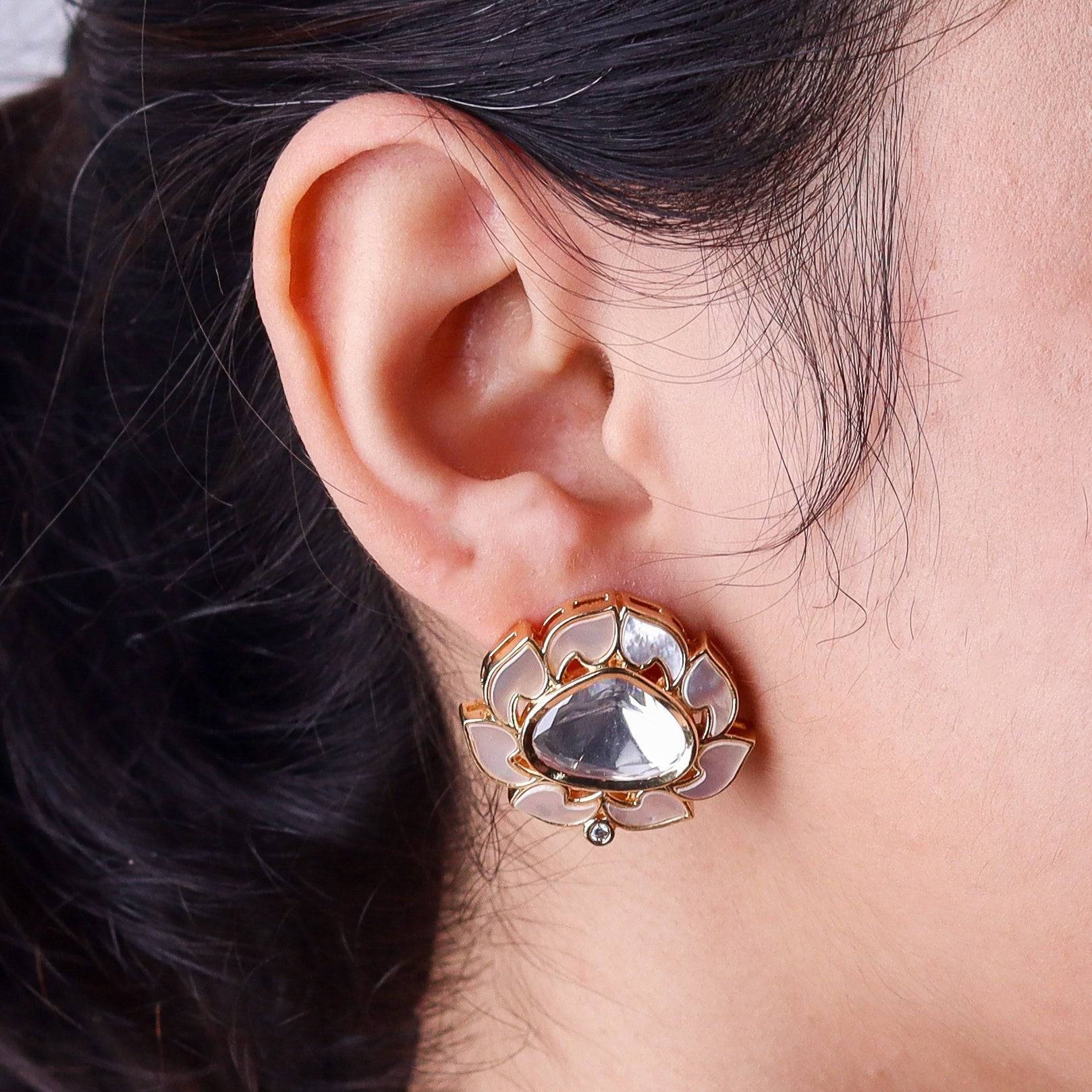 Model wearing a 22K gold-plated fashion earring for a sophisticated and contemporary jewelry look