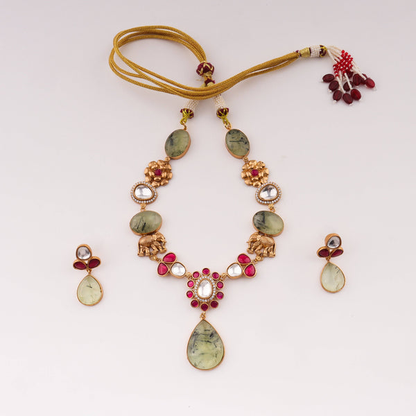 Detailed view of the 22K gold-plated fashion set highlighting intricate motifs, textured detailing, and premium 22K gold-plated finish