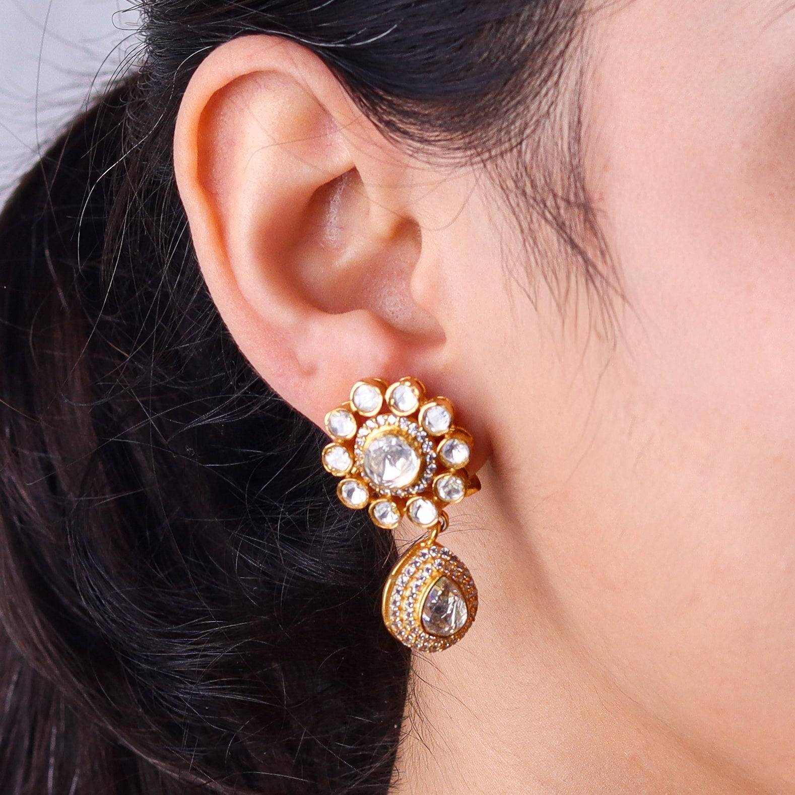 Model wearing 22K gold-plated fashion earring for a sophisticated and contemporary jewellery look