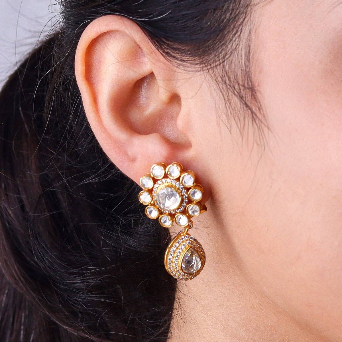 Model wearing 22K gold-plated fashion earrings for a sophisticated and contemporary jewellery look