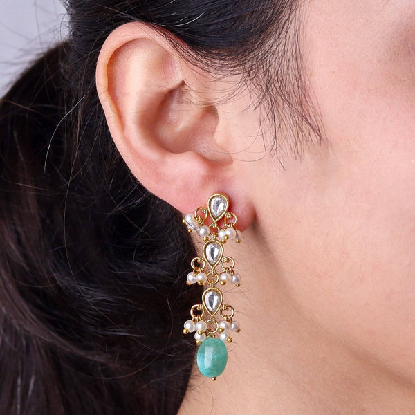 Model wearing 22K gold-plated fashion earrings for a sophisticated and contemporary jewelry look
