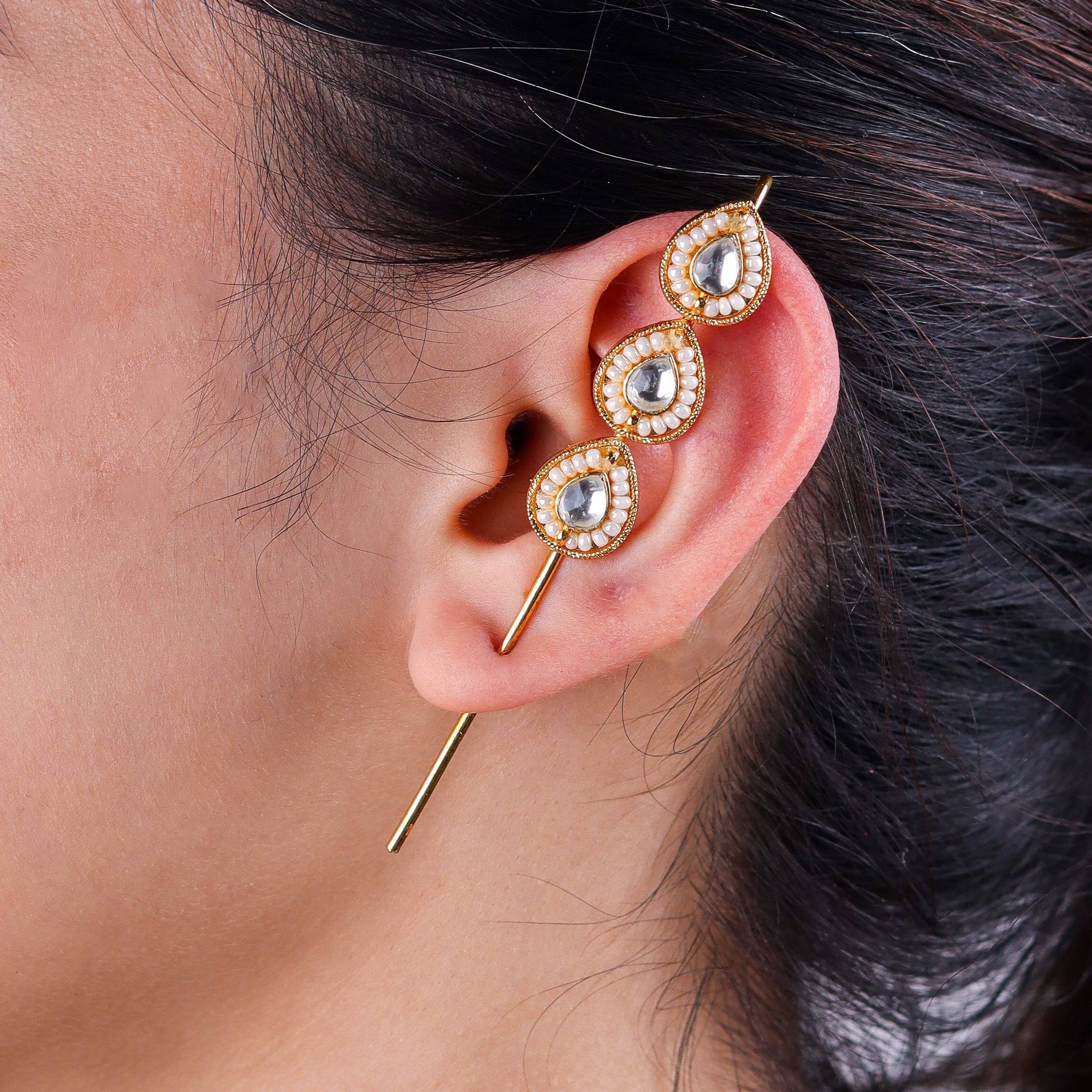 Model wearing 22K gold-plated fashion ear cuff for a sophisticated and contemporary jewelry look
