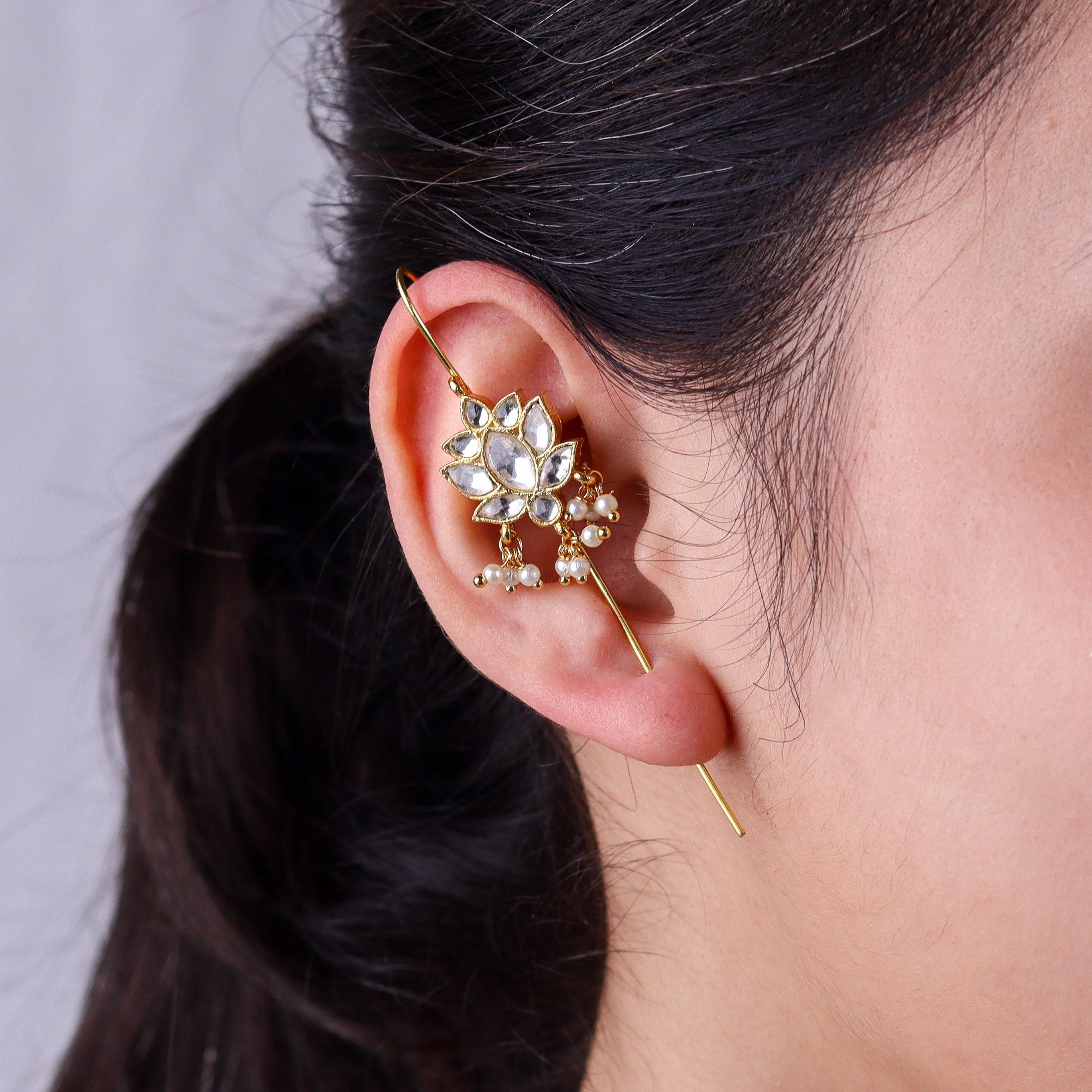 Model wearing a 22K gold-plated fashion ear cuff for a sophisticated and contemporary jewelry look