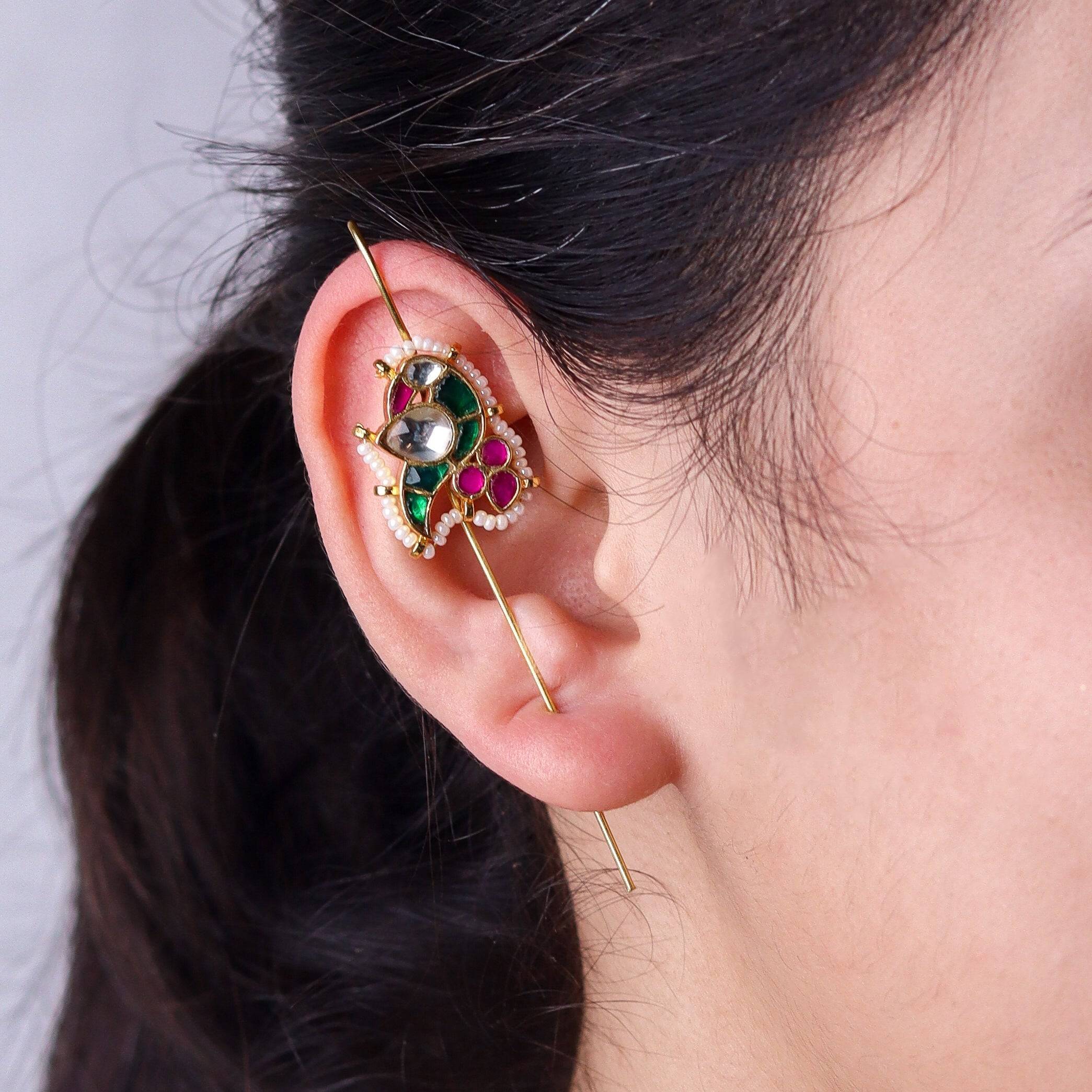 Model wearing a 22K gold-plated fashion ear cuff for a sophisticated and contemporary jewelry look