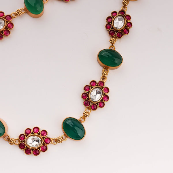 Angled view of the 22K gold-plated fashion set highlighting its coordinated design, elegant structure, and polished gold finish