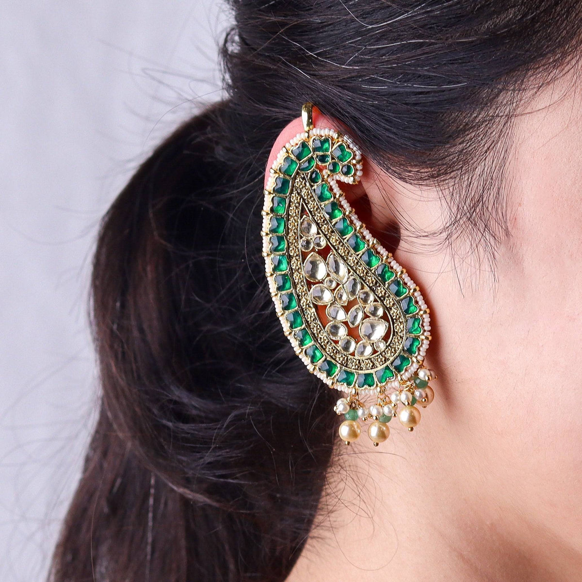 Model wearing a 22K gold-plated fashion ear cuff for a sophisticated and contemporary jewellery look