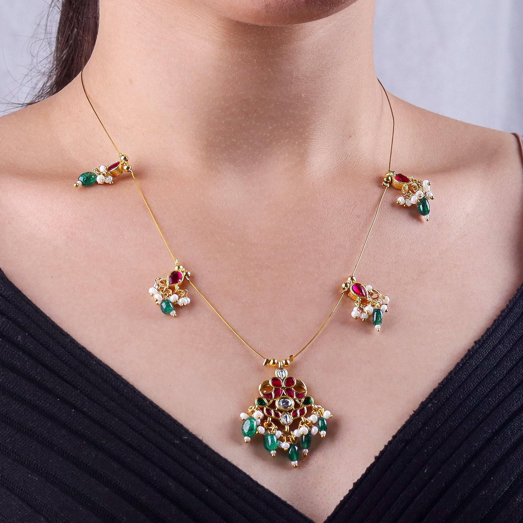 Model wearing 22K gold-plated fashion necklace for a sophisticated and elegant jewelry look