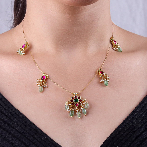 Model wearing 22K gold-plated fashion necklace for a sophisticated and elegant jewelry look