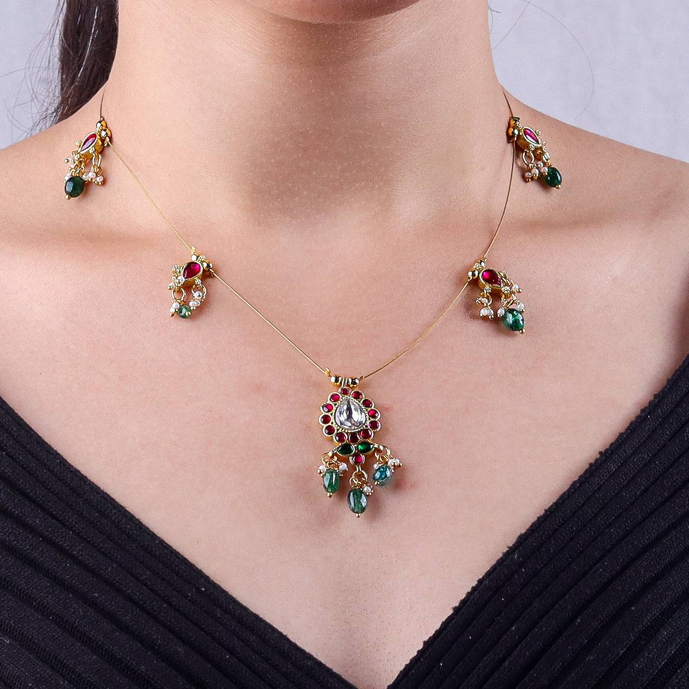 Model wearing a 22K gold-plated fashion necklace for a sophisticated and elegant jewelry look