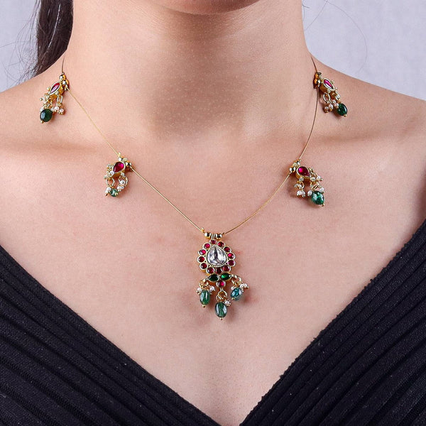 Model wearing a 22K gold-plated fashion necklace for a sophisticated and elegant jewelry look