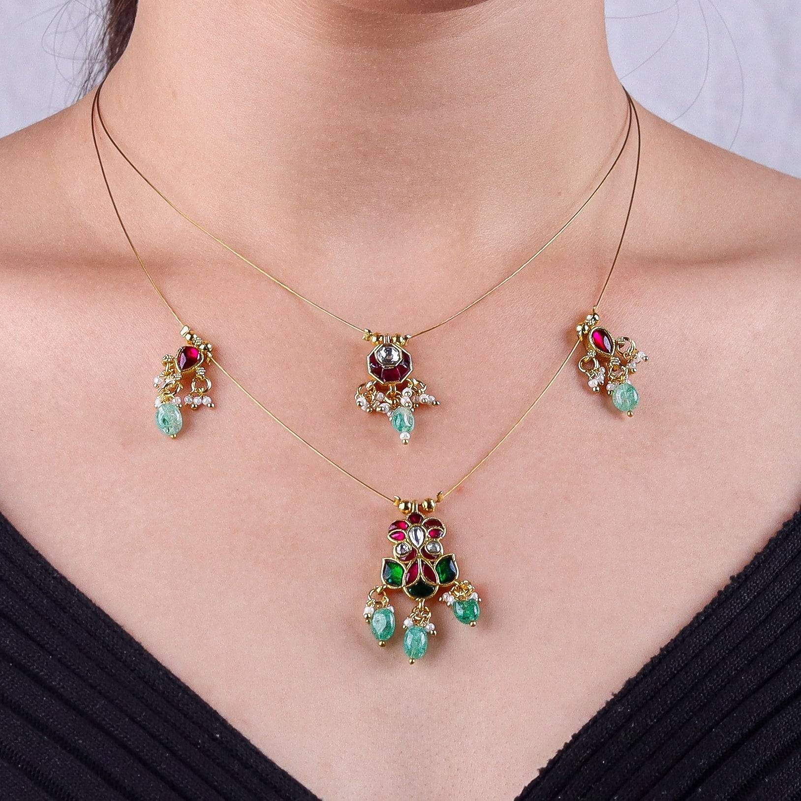 Model wearing a 22K gold-plated fashion necklace for a sophisticated and elegant jewelry look