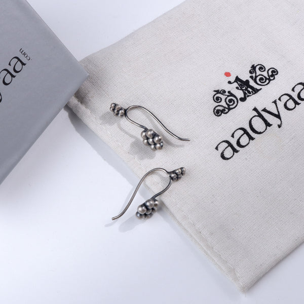 Silver Kudi Bugadi earrings with traditional design and polished finish