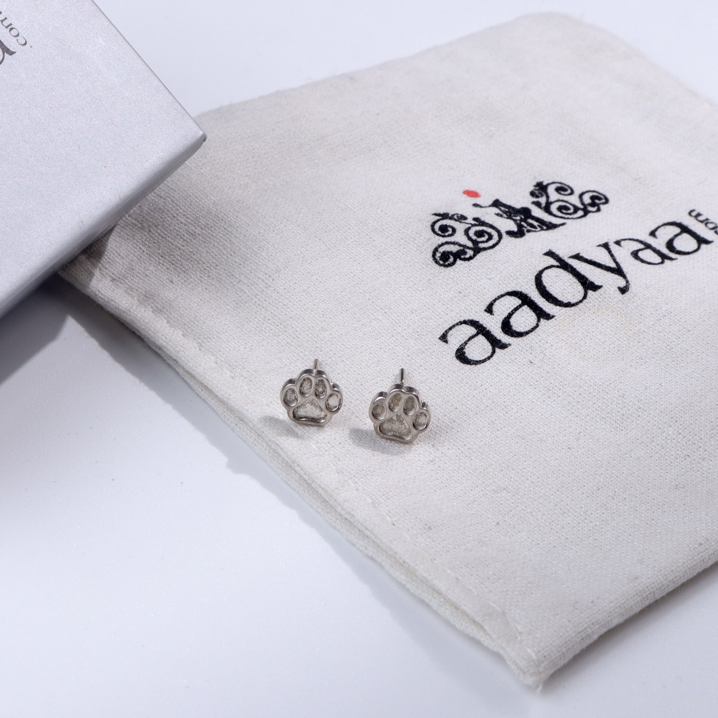 Silver paw stud earrings for pet lovers