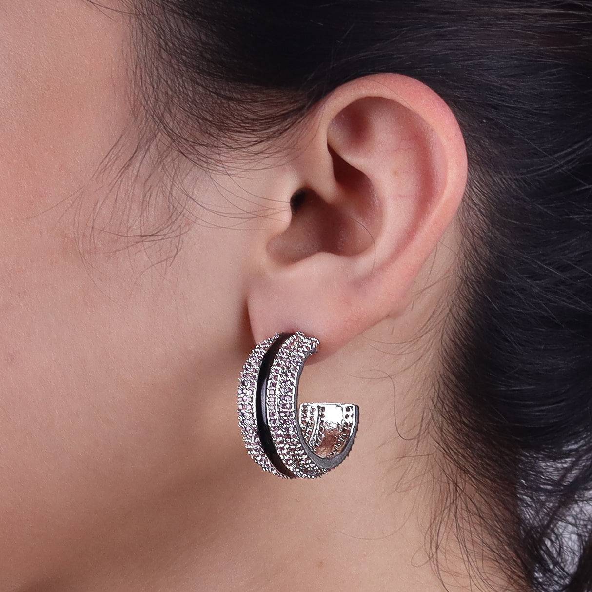 Model wearing fashion earrings for a stylish and contemporary jewelry look