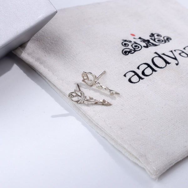 Sterling silver rose earrings on Aadyaa jewelry pouch