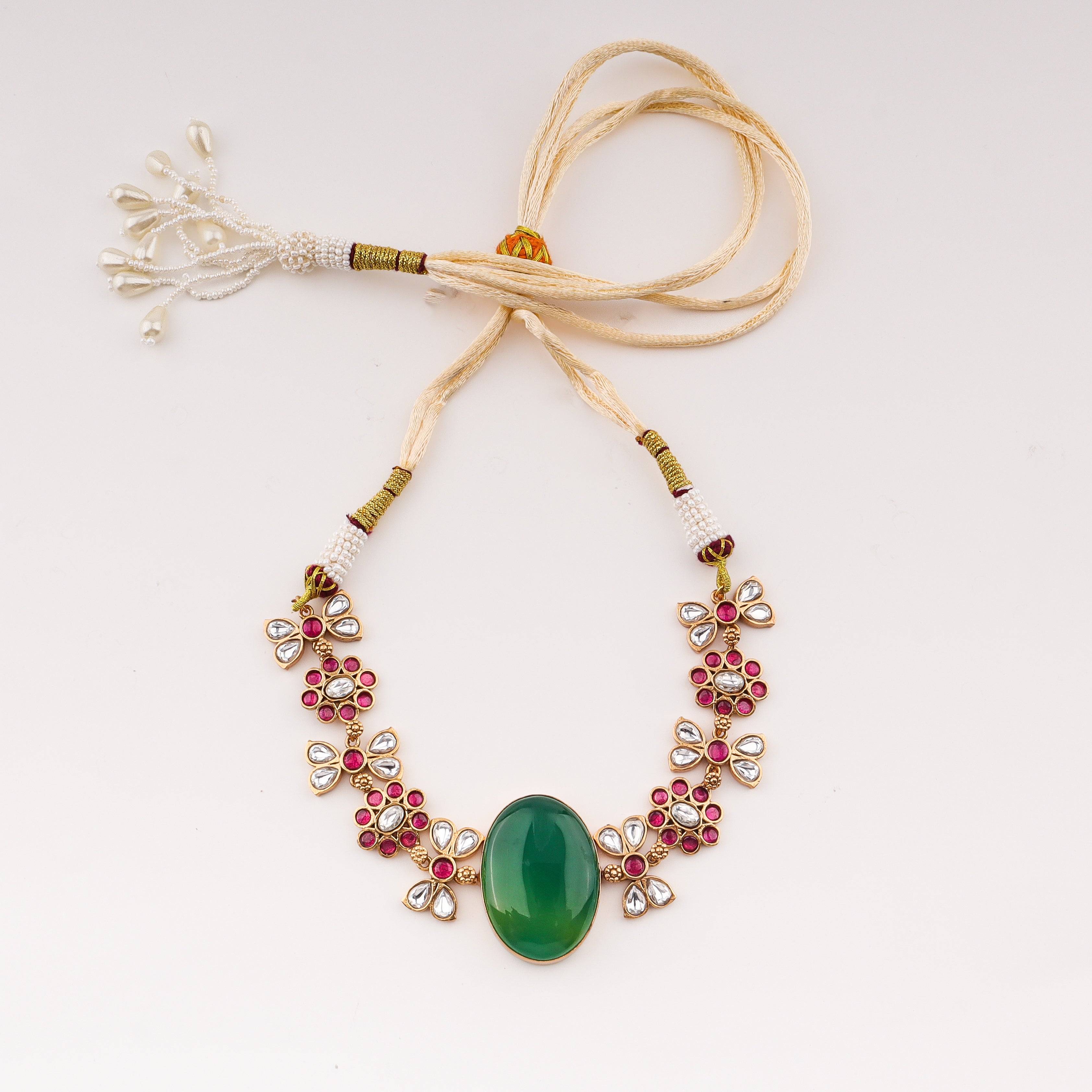 Flat-lay of 22K Gold Plated Fashion Set with complementary gold-plated jewellery and elegant festive accessories