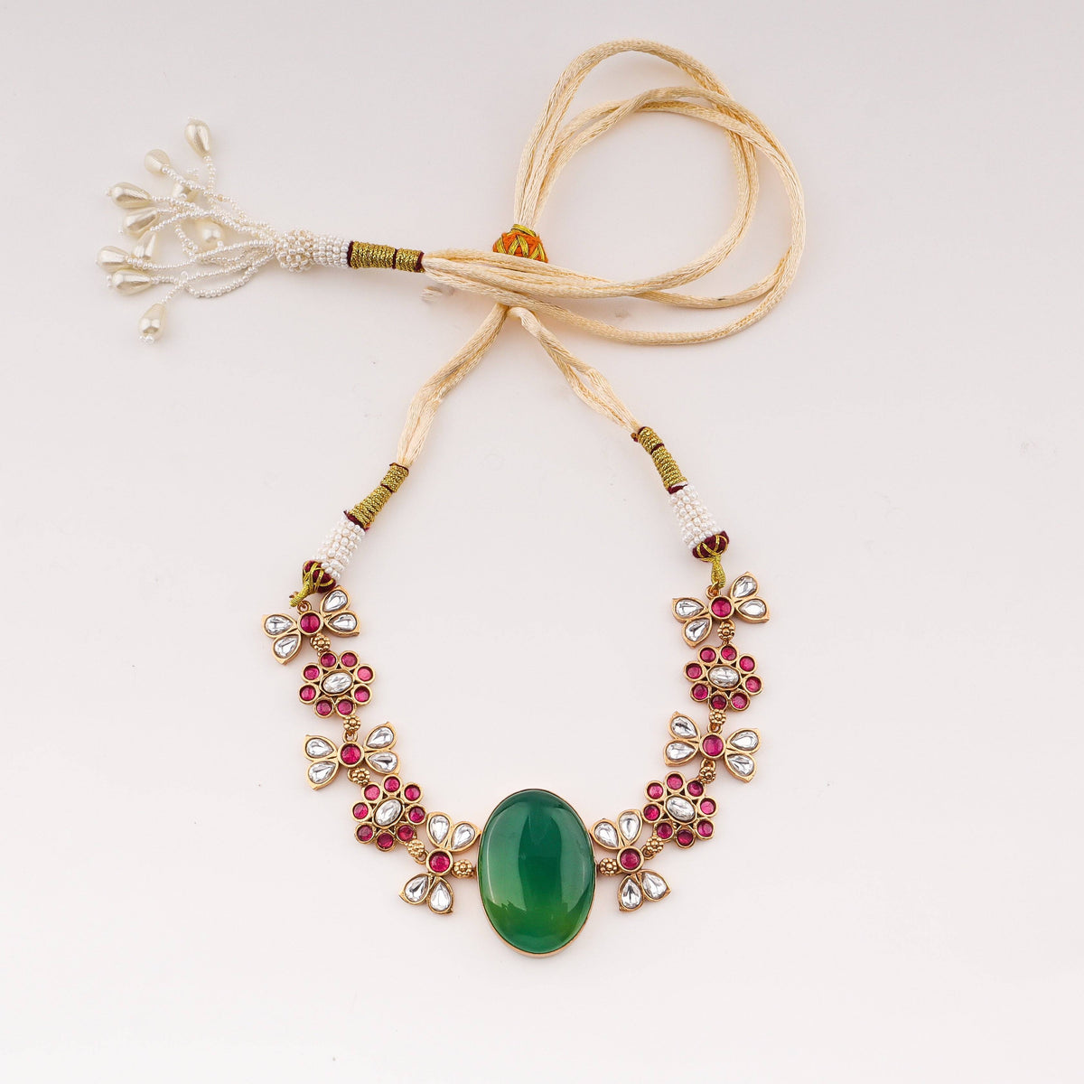 Flat-lay of 22K Gold Plated Fashion Set with complementary gold-plated jewellery and elegant festive accessories