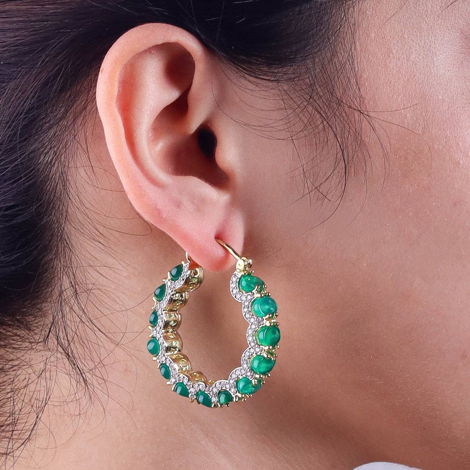 Model wearing a 22K gold-plated fashion earring for a sophisticated and contemporary jewelry look