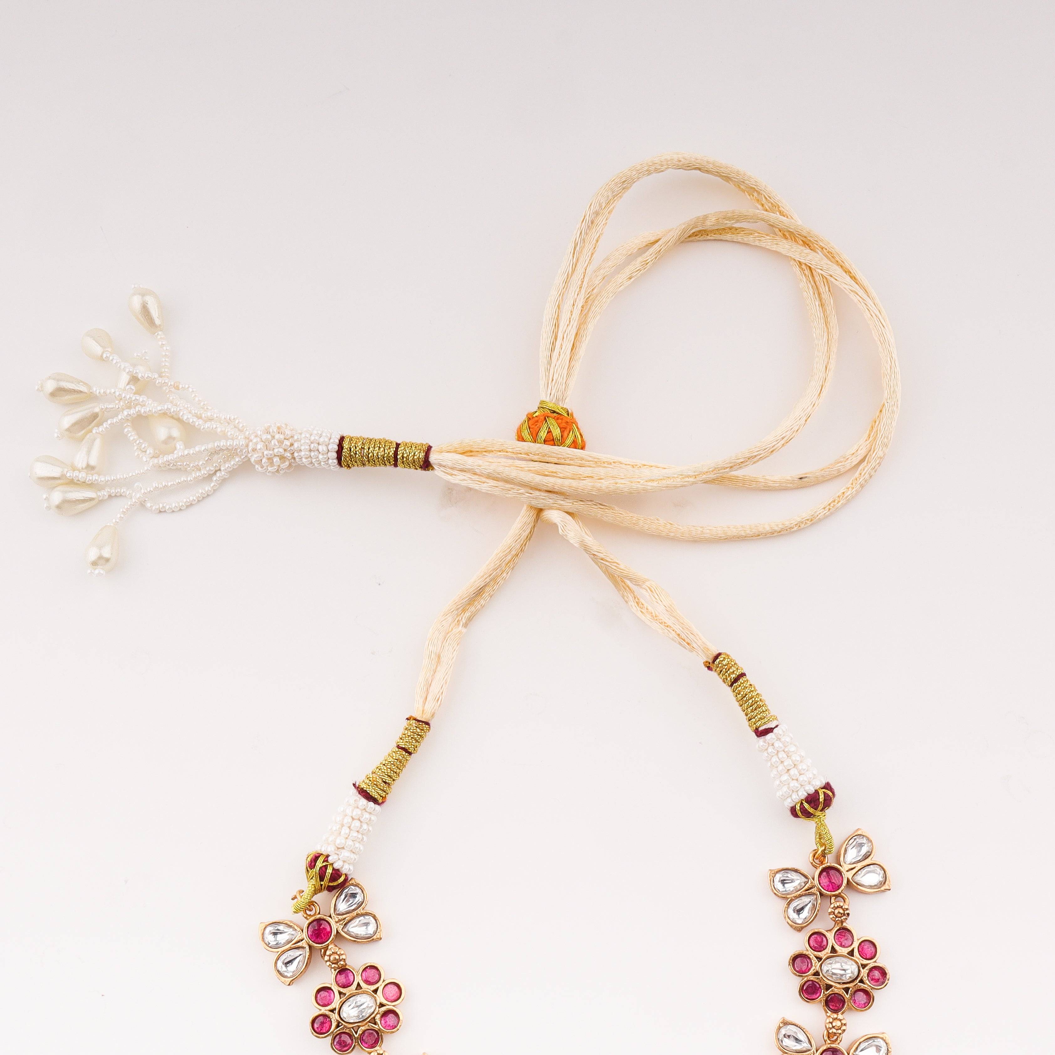Angled view of 22K gold-plated fashion set highlighting its coordinated design, elegant structure, and polished gold finish