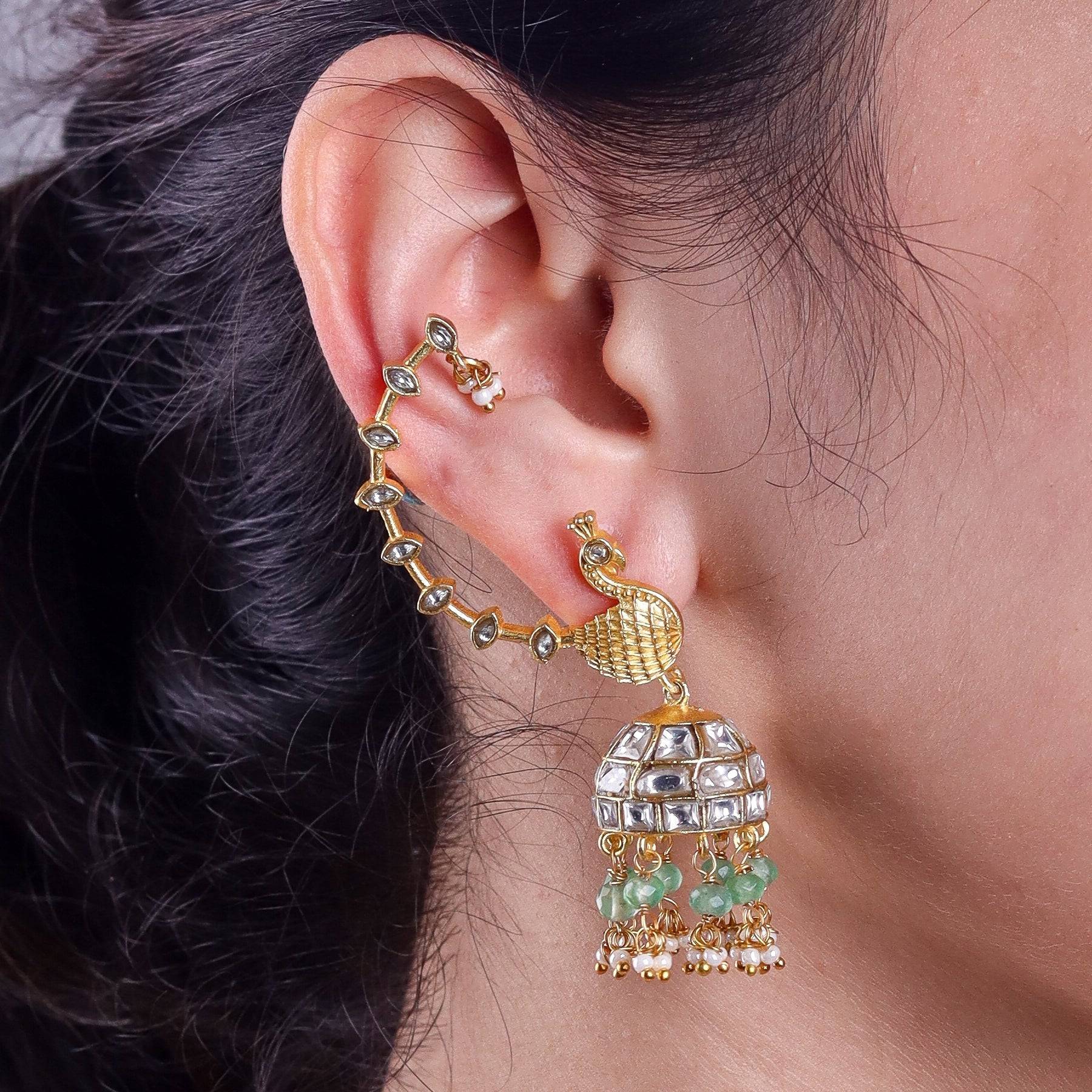 Model wearing a 22K gold-plated fashion ear cuff for a sophisticated and contemporary jewelry look