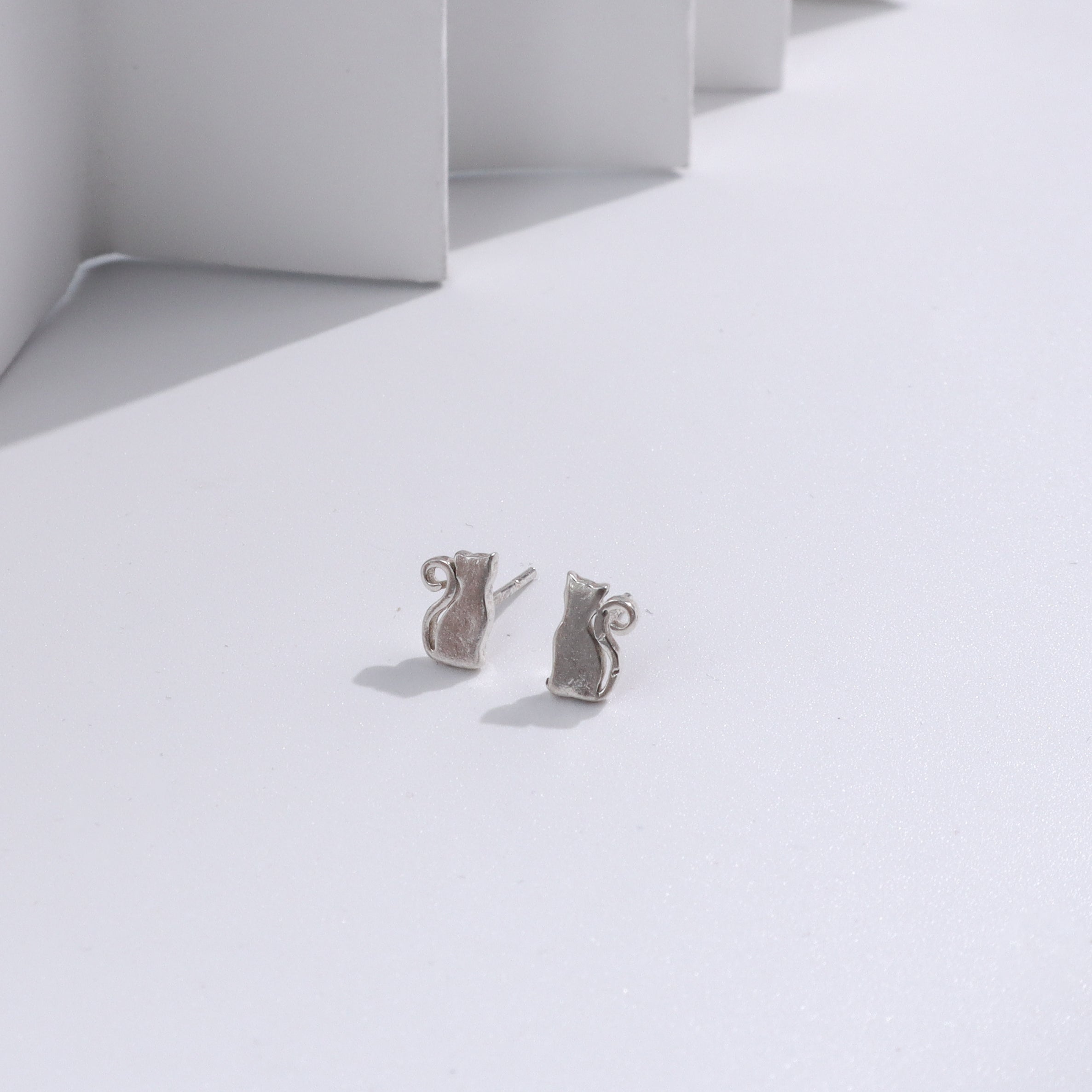 Silver cat stud earrings for jewelry lovers