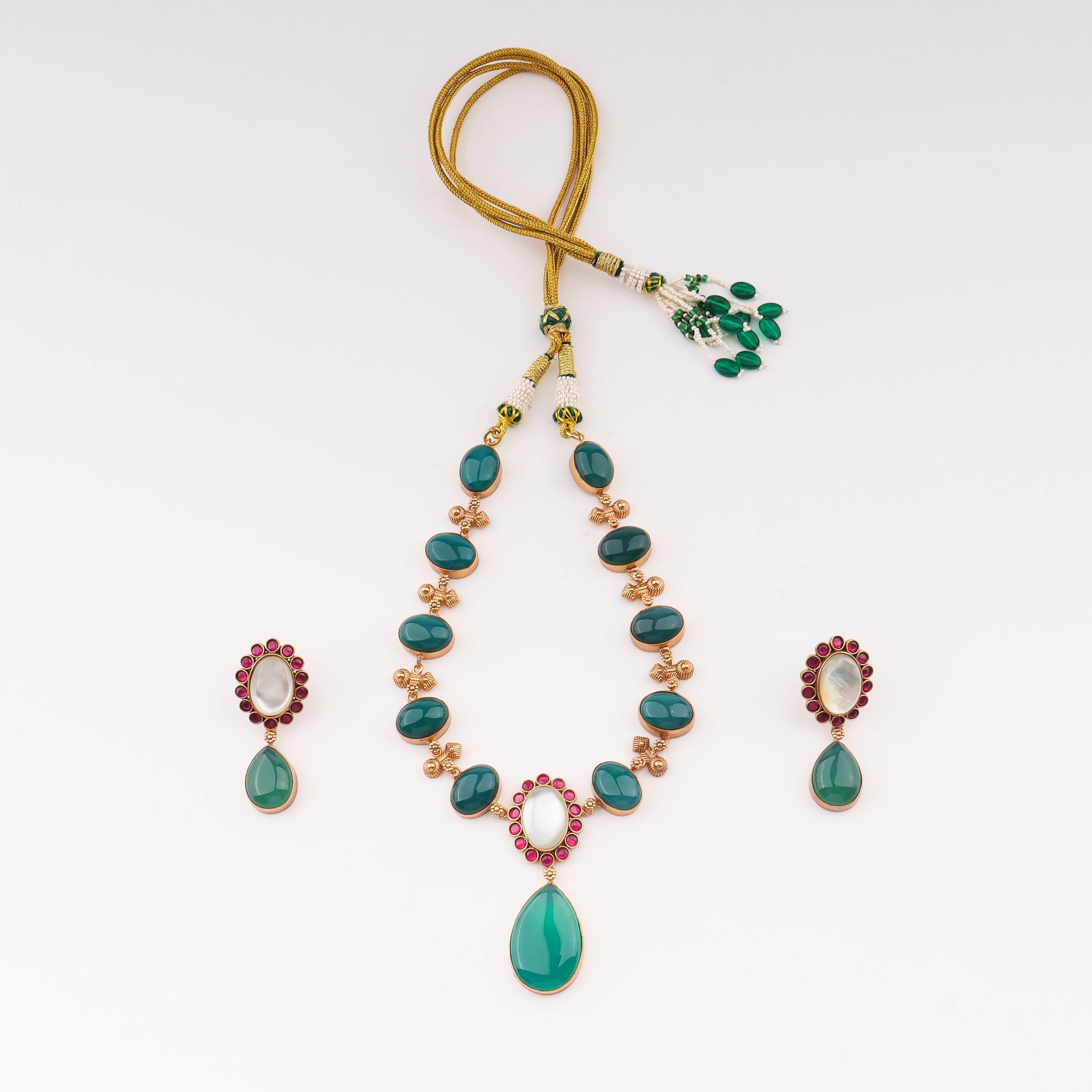 Detailed view of 22K gold-plated fashion sets highlighting intricate motifs, textured detailing, and premium 22K gold-plated finish
